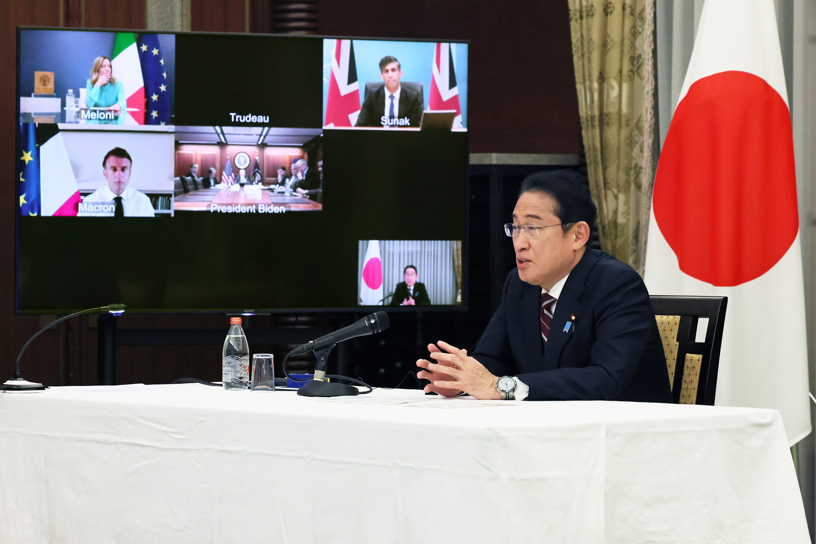 Prime Minister Kishida attending a video conference