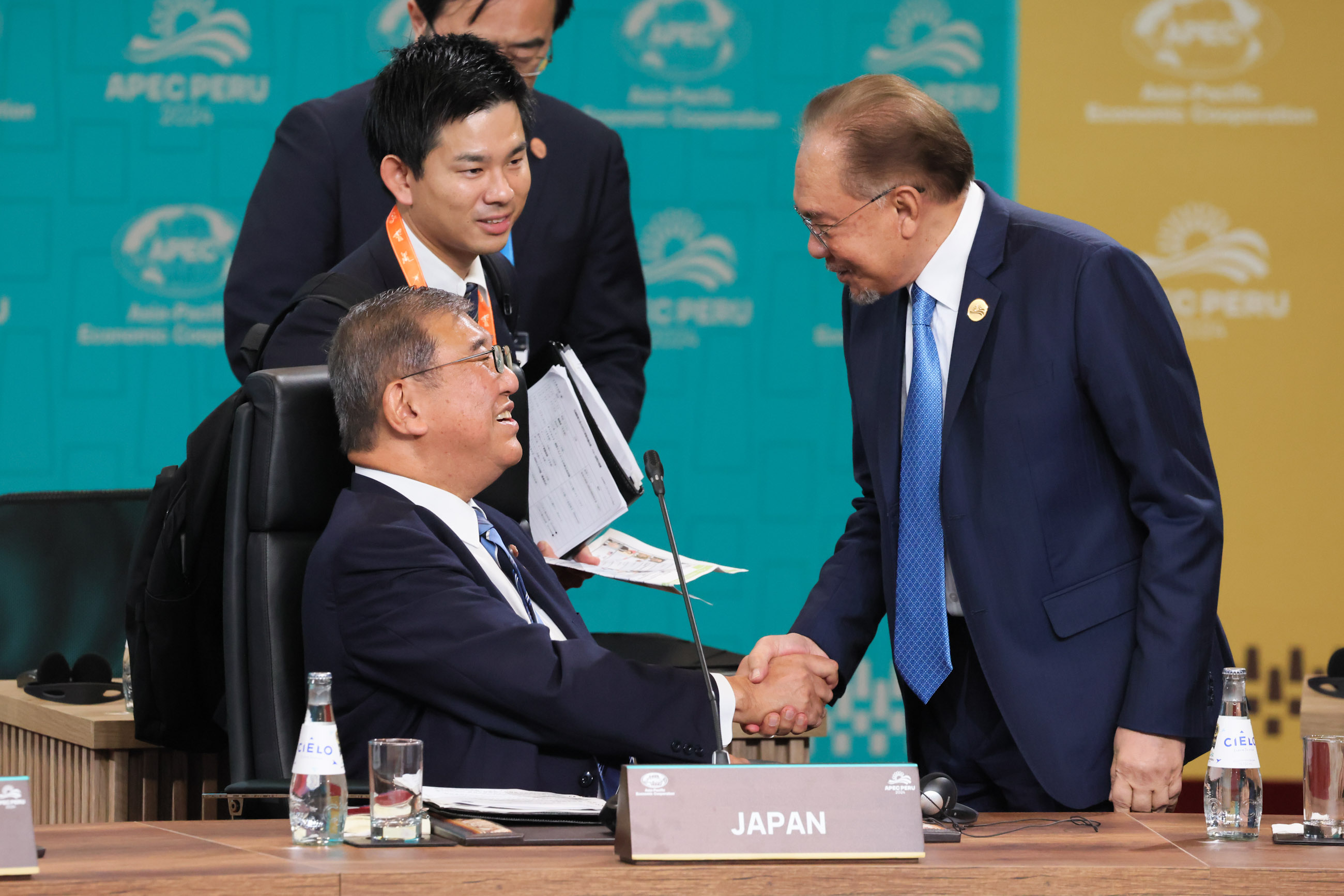 PM Ishiba greeting PM Anwar Ibrahim of Malaysia