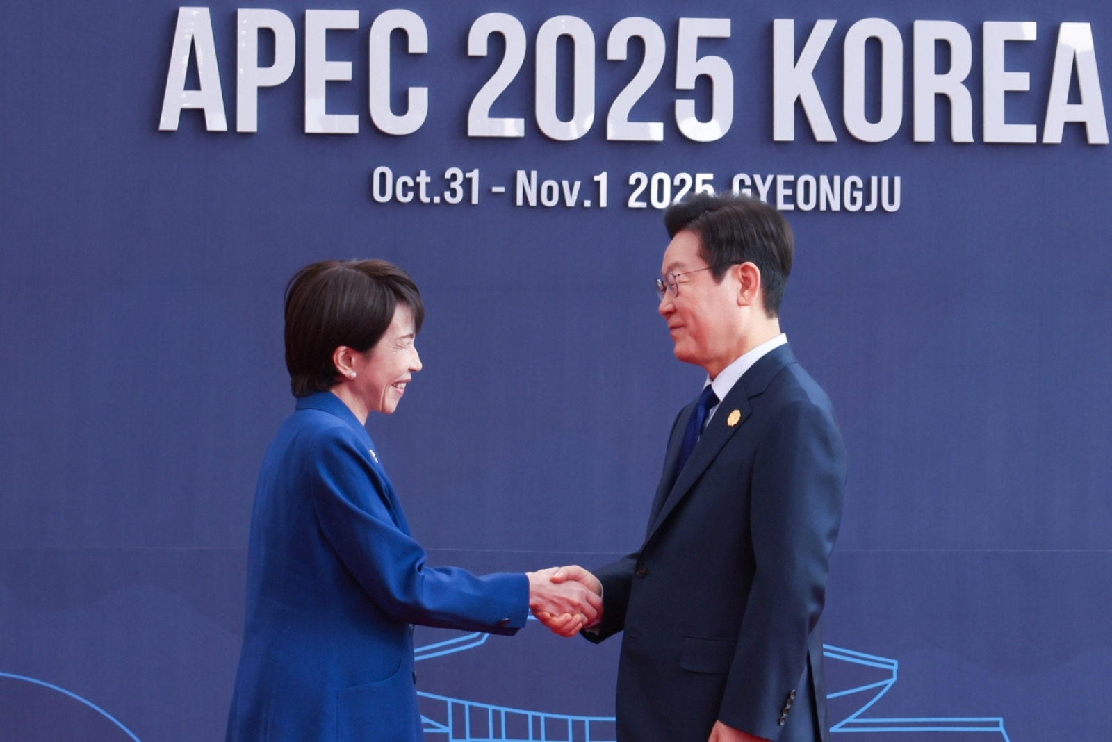 Prime Minister Takaichi being welcomed by President Lee Jae Myung of the ROK (1)