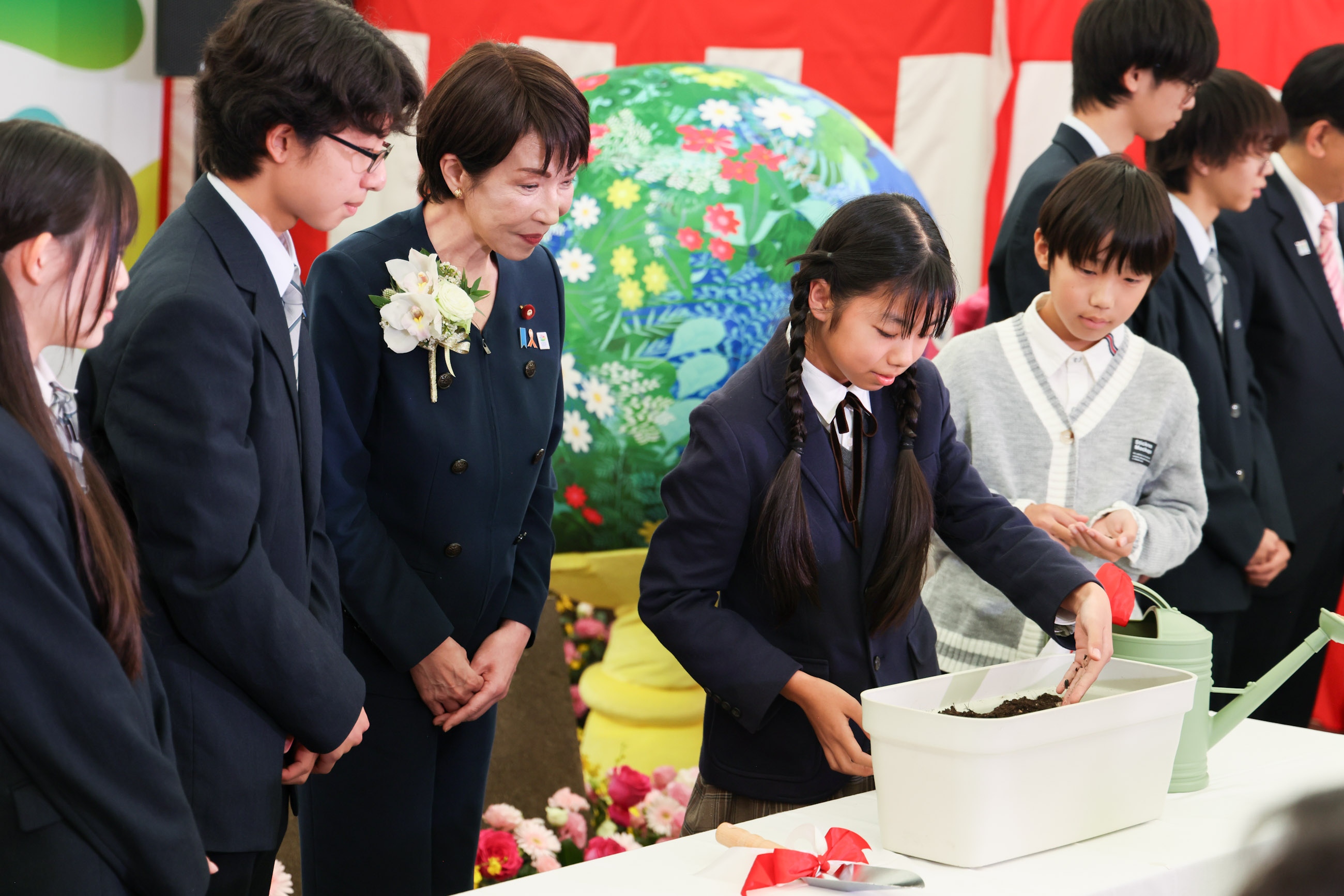 Prime Minister Takaichi participating in a seed-sowing ceremony (1)