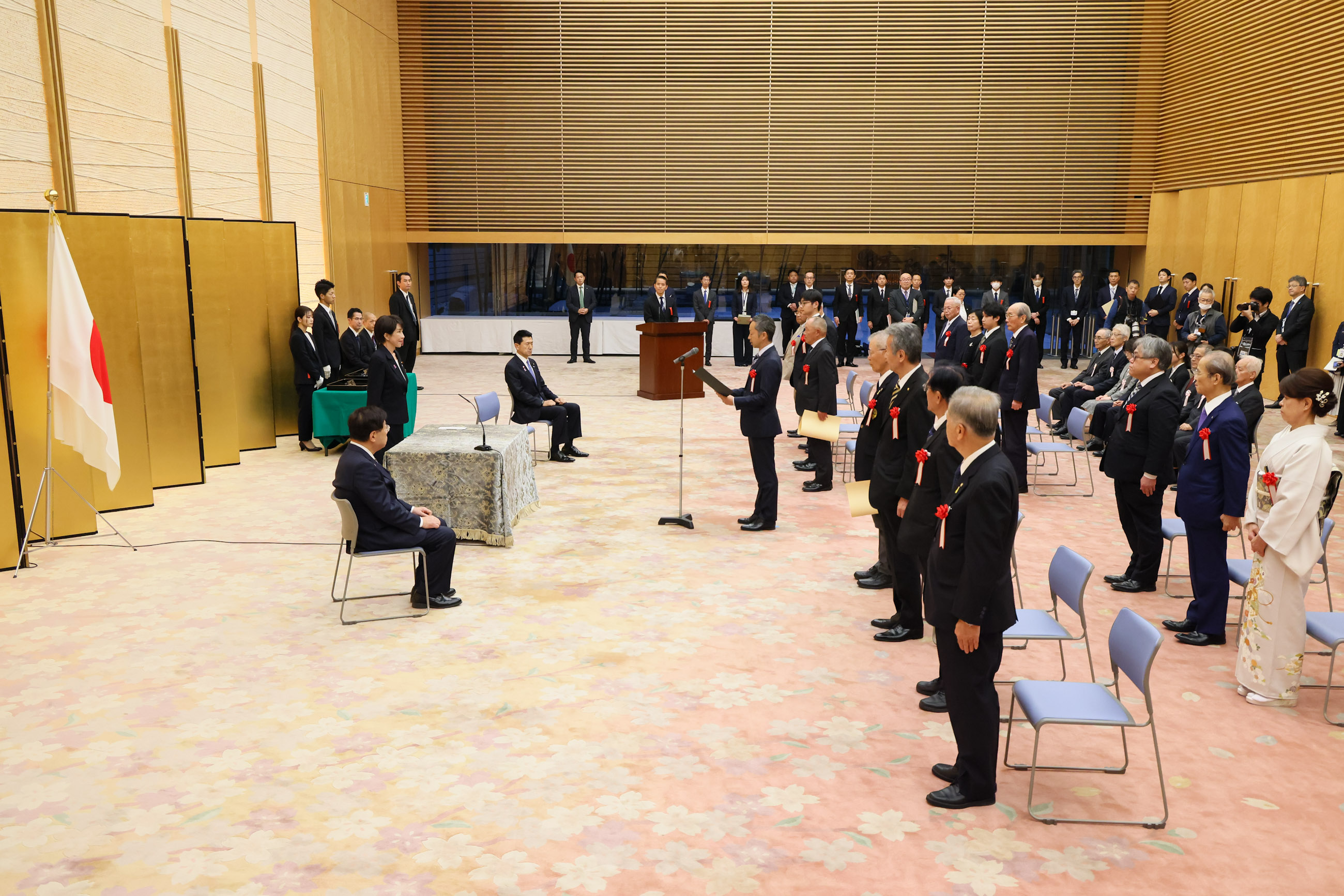 The representative of the award recipients delivering an address