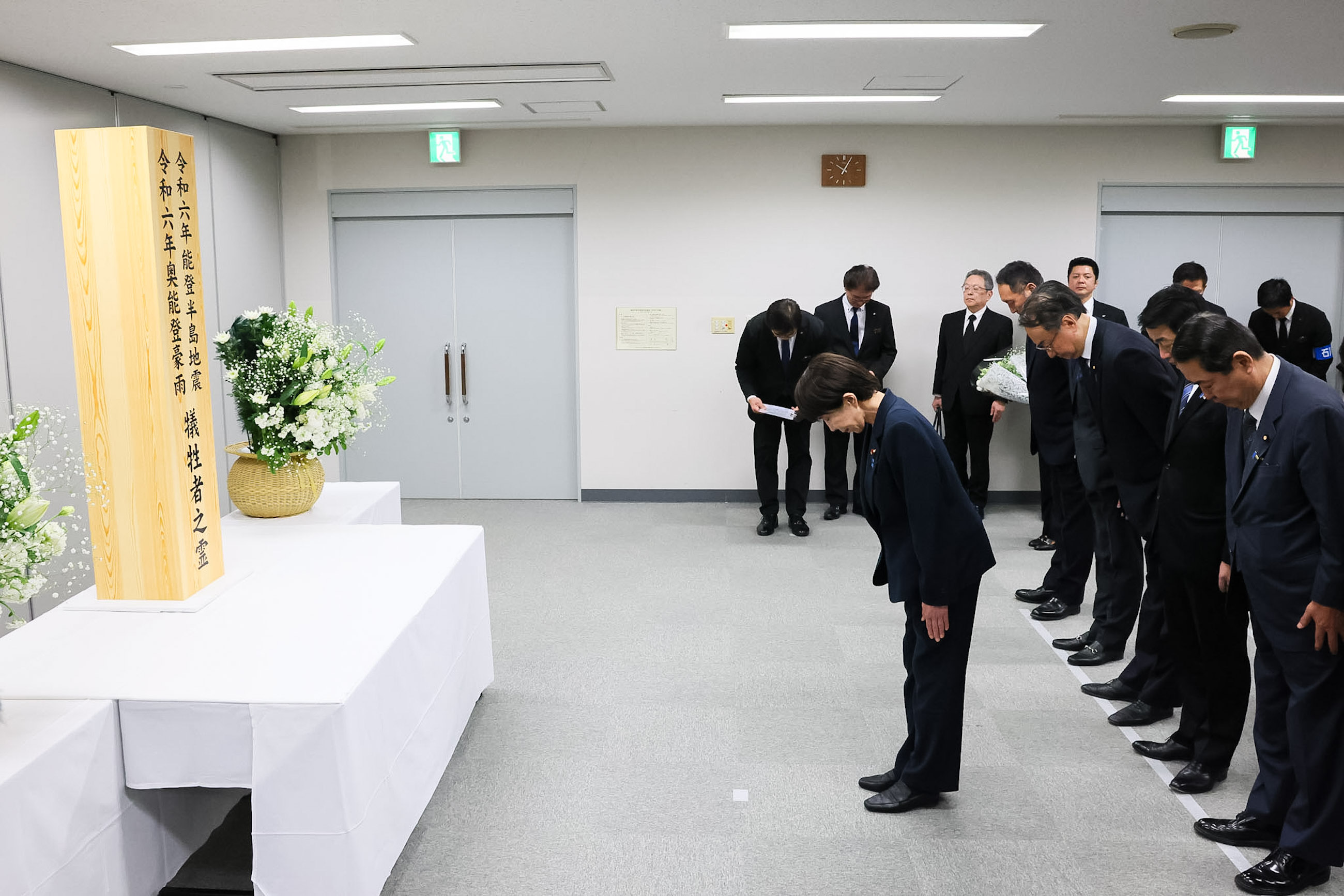 Prime Minister Takaichi observing a moment of silence (1)