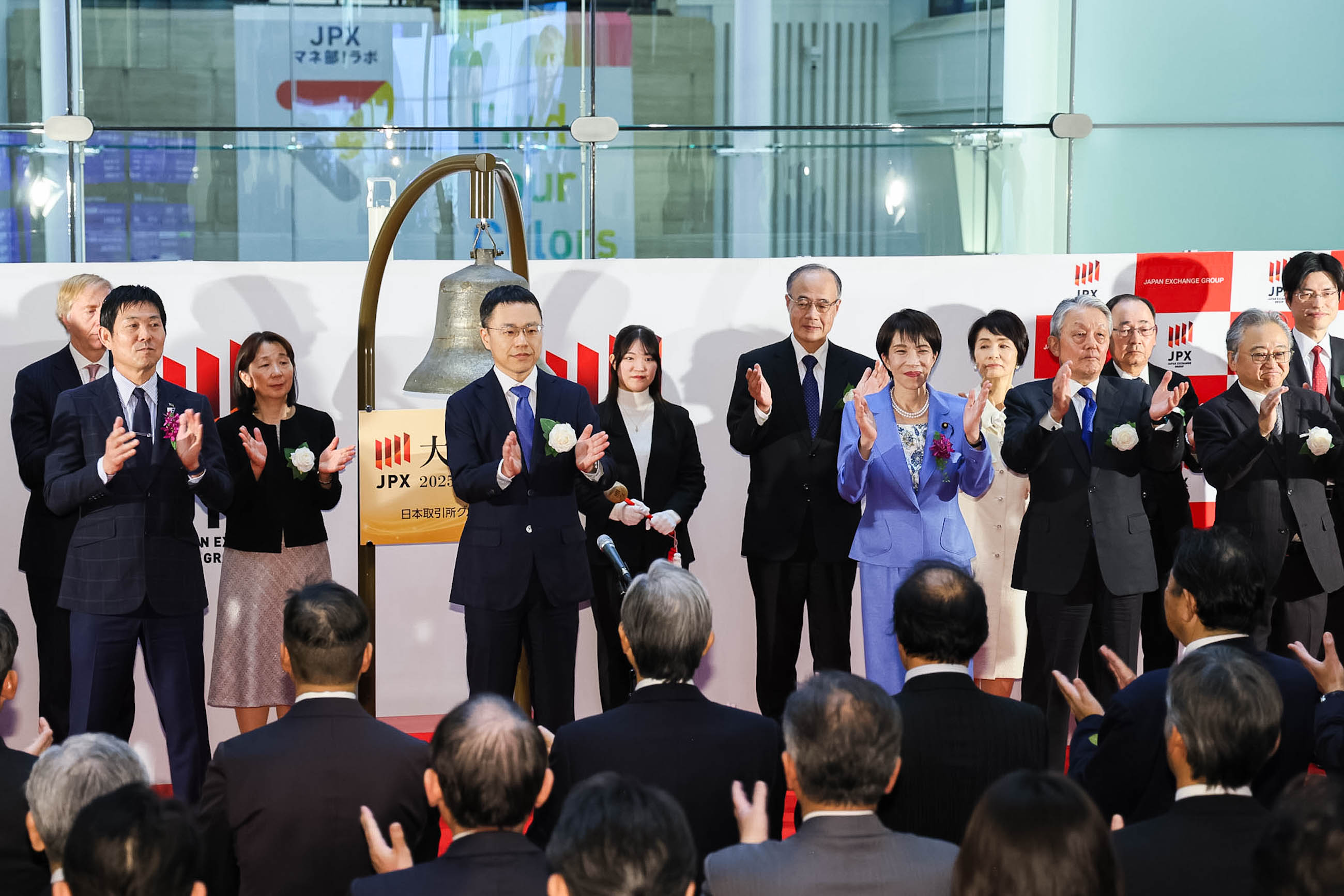 Prime Minister Takaichi joining the ceremonial hand clapping (1)
