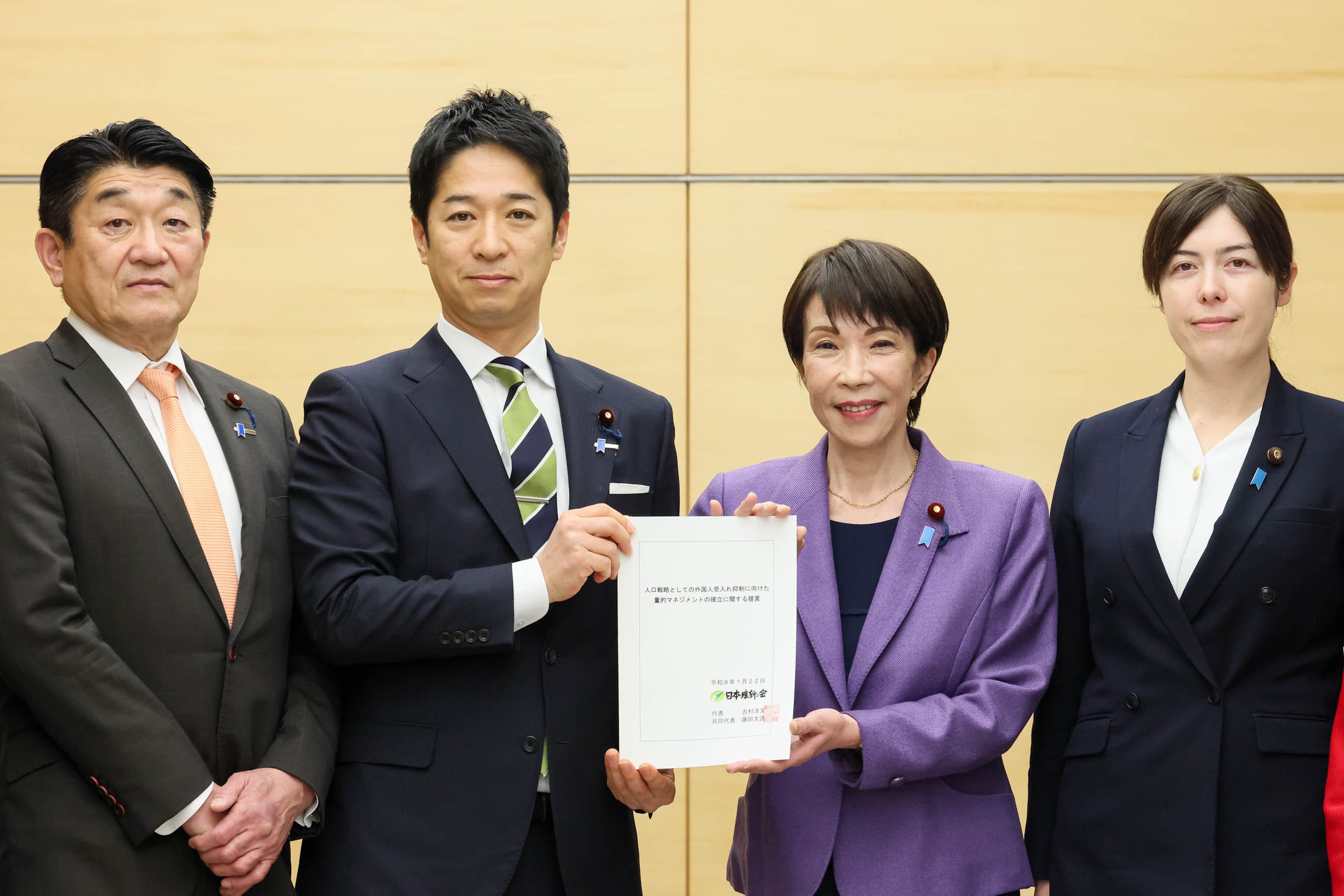 Prime Minister Takaichi receiving a proposal (2)