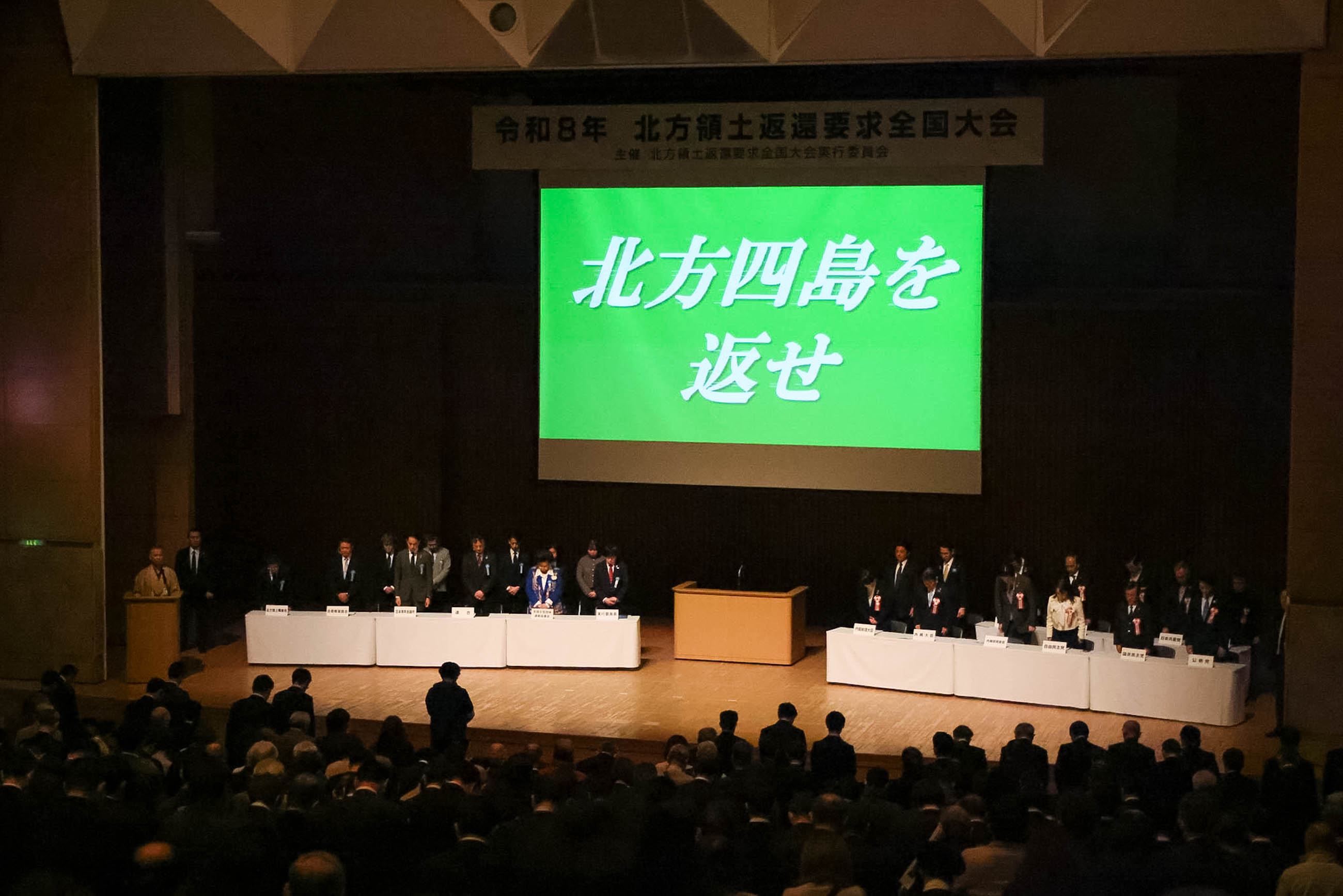 Prime Minister Takaichi observing a moment of silence (2)