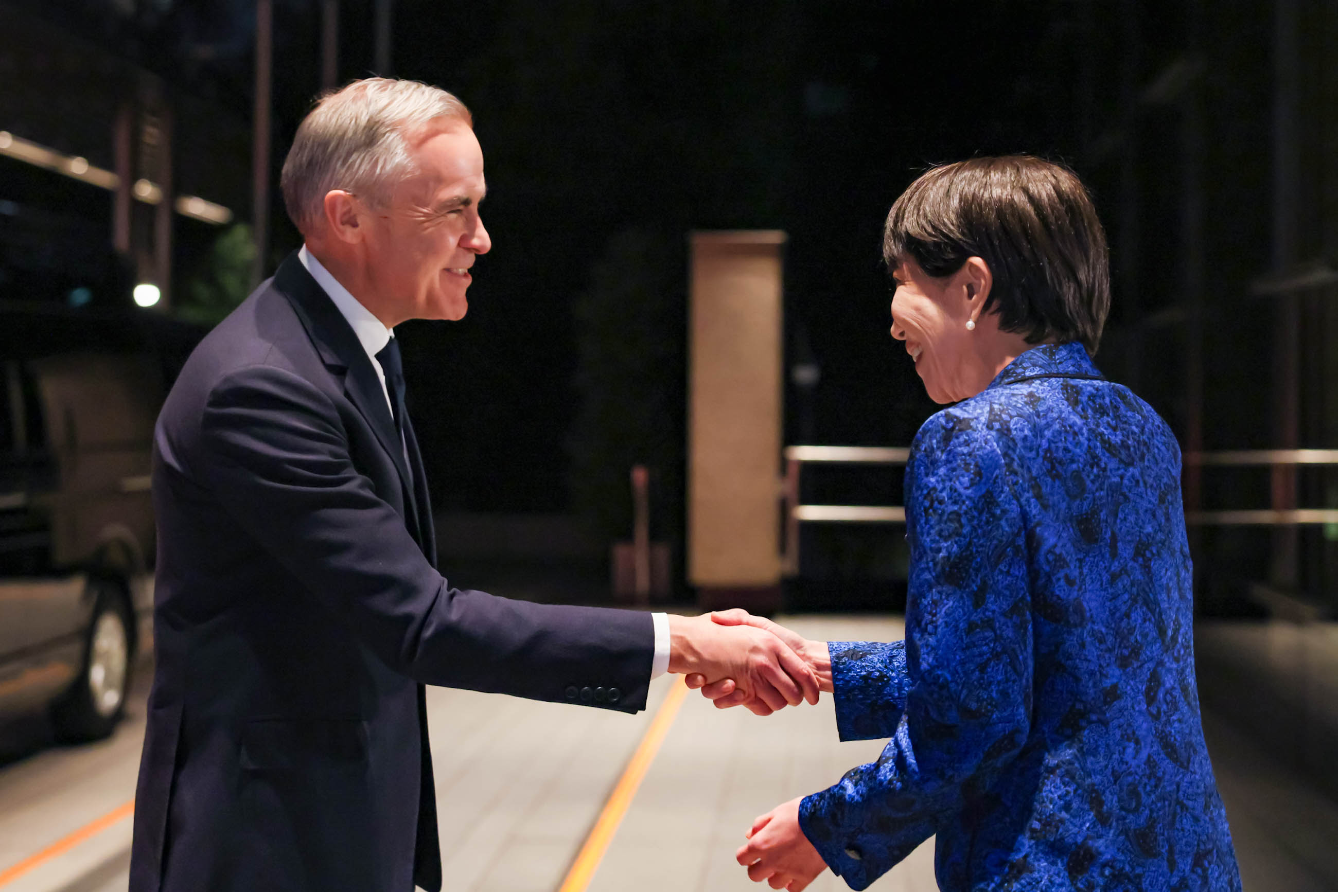 Prime Minister Takaichi welcoming Prime Minister Carney