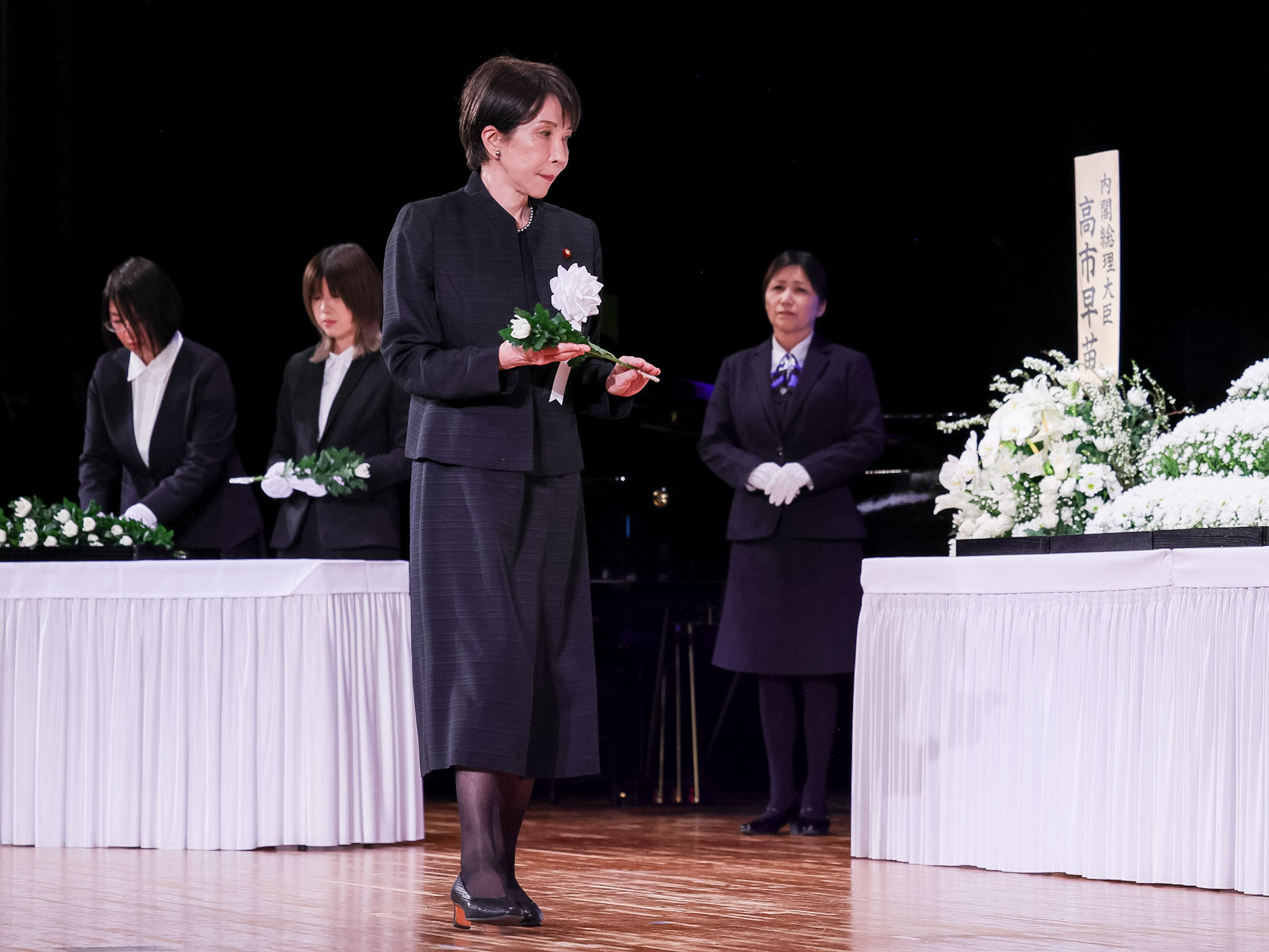 Prime Minister Takaichi laying flowers (1)