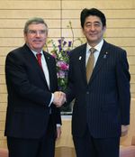 Photograph of Prime Minister Abe shaking hands with the IOC President
