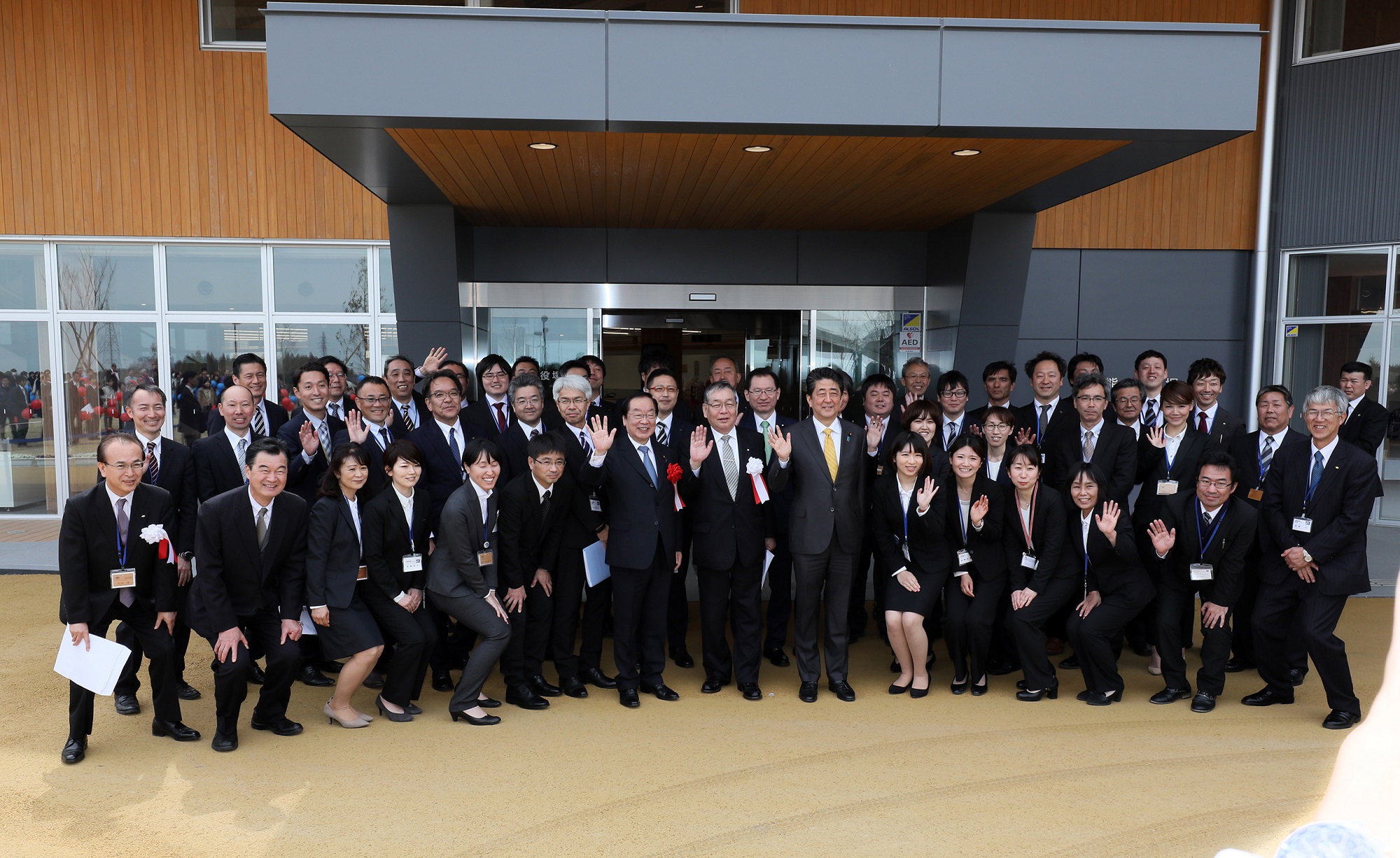 Photograph of a photo session at the new Okuma Town Hall building