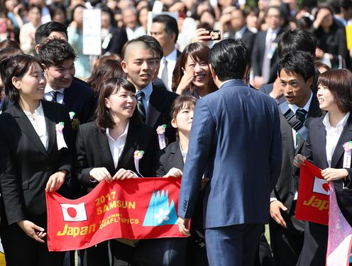 Photograph of the Prime Minister conversing with guests