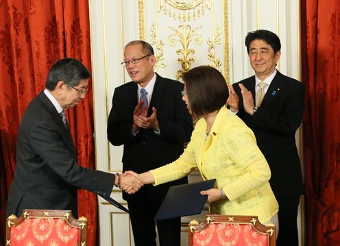 Photograph of the leaders attending the signing ceremony