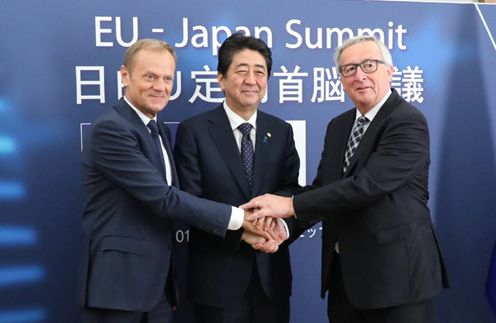 Photograph of the Prime Minister shaking hands with the President of the European Council and the President of the European Commission