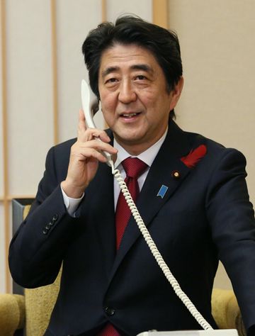 Photograph of the Prime Minister making the congratulatory telephone call