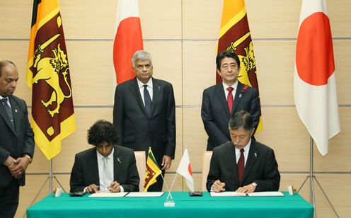 Photograph of the leaders attending the signing ceremony