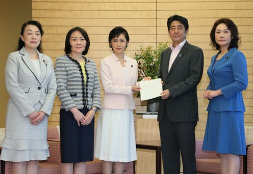 Photograph of the Prime Minister receiving the letter of request