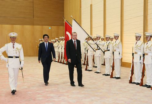 Photograph of the ceremony by the guard of honor