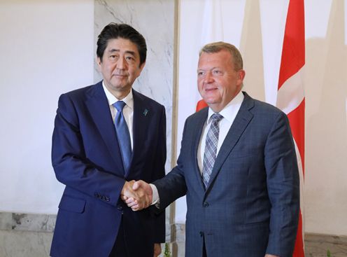 Photograph of the Prime Minister being welcomed by the Prime Minister of Denmark