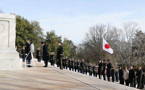 Photograph of the Prime Minister offering a silent prayer at Arlington National Cemetery