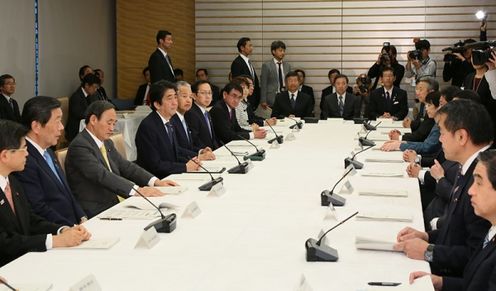 Photograph of the Prime Minister attending the meeting
