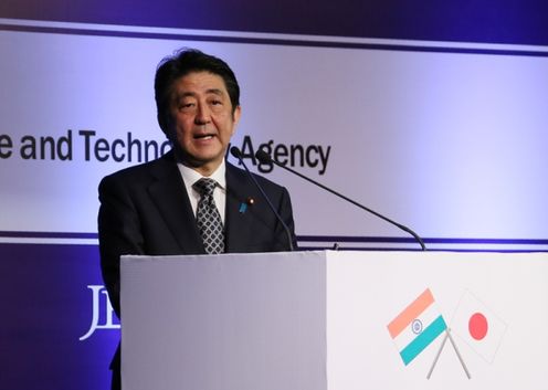 Photograph of the Prime Minister delivering an address at the Japan-India Innovation Seminar (1)