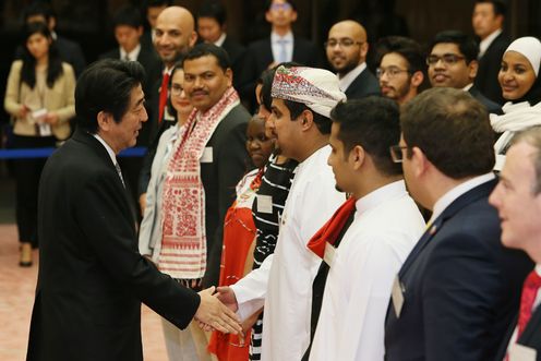 Photograph of the Prime Minister shaking hands with the representatives