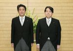 Photograph of the Prime Minister attending a photograph session with the newly appointed Minister Hayashi