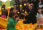 Photograph of the Prime Minister and the Duke of Cambridge engaging with children at the children’s facility