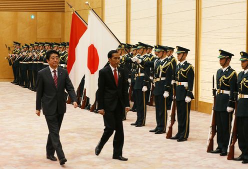 Photograph of the ceremony by the guard of honor