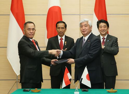 Photograph of the leaders attending the signing ceremony