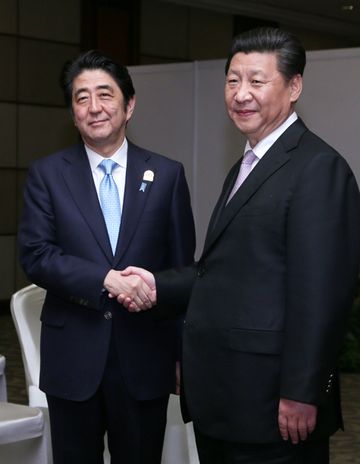 Photograph of the Prime Minister shaking hands with the President of China