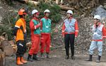 Photograph of the Prime Minister exchanging views with workers from the Nakahechi Town Forest Union conducting forest thinning