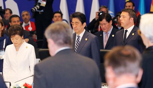 Photograph of the leaders observing a moment of silence at the beginning of Session-I to express their condolences to the victims of the terrorist attacks in Paris (pool photo)