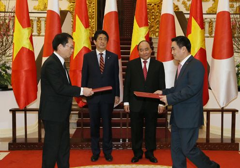 Photograph of the leaders attending the signing ceremony