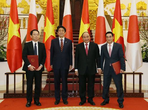 Photograph of the leaders attending the signing ceremony