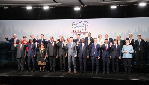 Photograph of the group photograph session with the leaders of the G7 members and invited outreach countries