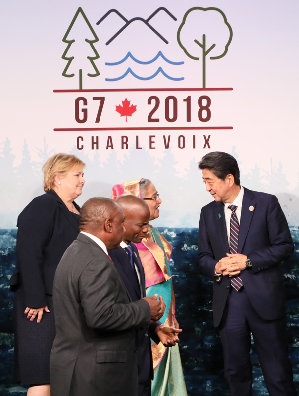 Photograph of the group photograph session with the leaders of the G7 members and invited outreach countries