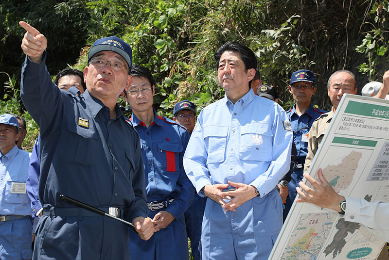 Photograph of the Prime Minister visiting a site affected by landslide