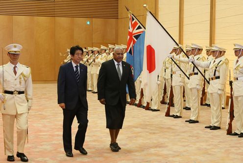 Photograph of the ceremony by the guard of honor