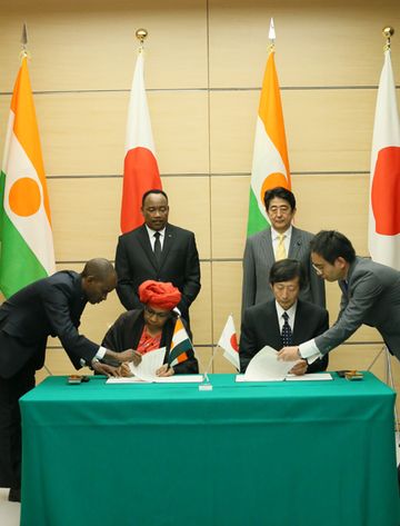 Photograph of the leaders attending the signing ceremony