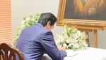 Photograph of the Prime Minister paying his condolences (1)