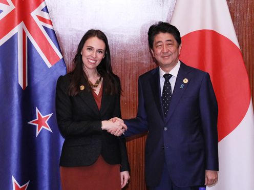 Photograph of the Prime Minister shaking hands with the Prime Minister of New Zealand