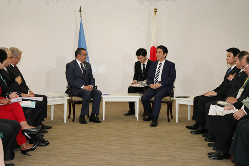 Photograph of the Prime Minister receiving a courtesy call from the Director-General of WHO