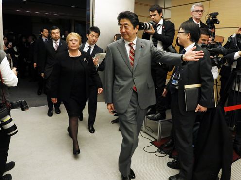 Photograph of the leaders heading to the signing ceremony and joint press announcement