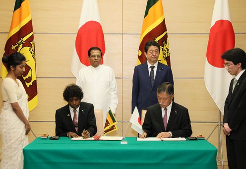 Photograph of the leaders attending the signing ceremony