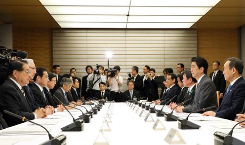 Photograph of the Prime Minister attending the meeting