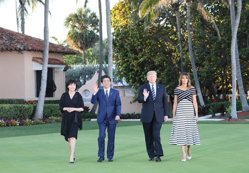 Photograph of the Prime Minister and Mrs. Abe taking a walk with the President and First Lady of the United States