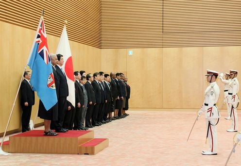 Photograph of the salute and the guard of honor ceremony