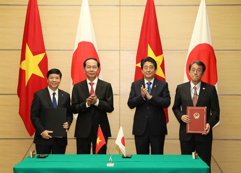 Photograph of the leaders attending the signing ceremony