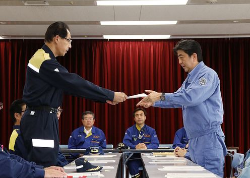 Photograph of the Prime Minister receiving a letter of request