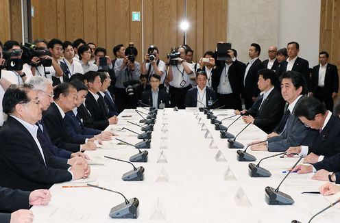 Photograph of the Prime Minister attending the meeting